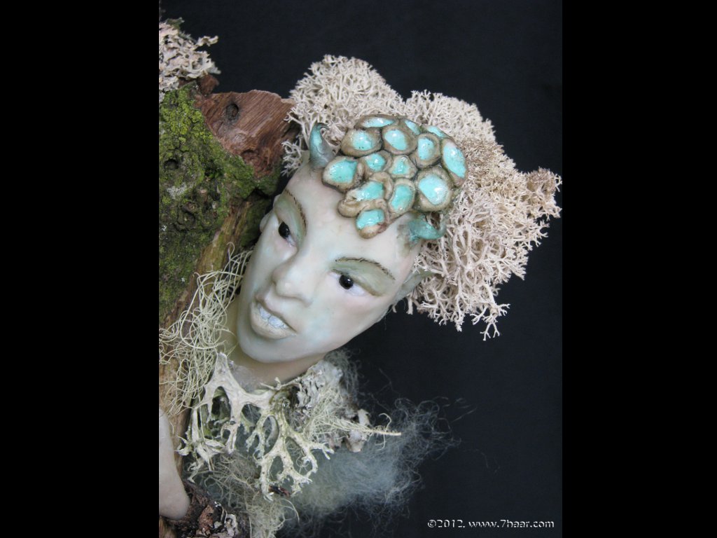 Figur auf Holz mit Holzsockel<br>Detail Kopf