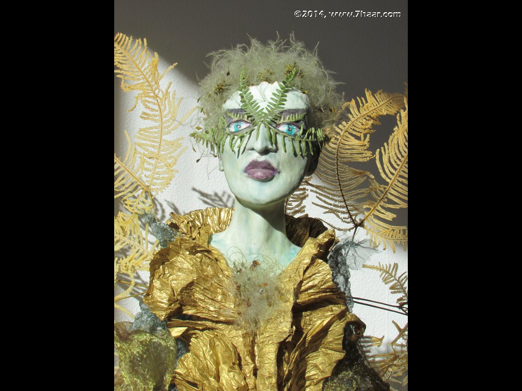 Figur auf Holzsockel<br>Ausschnitt Kopf